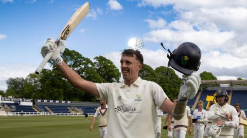 Ryan Hadley celebrates after batting Glamorgan to victory against Somerset