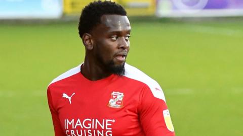 Diallang Jaiyesimi in action for Swindon