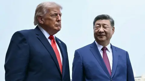 China's President Xi Jinping and US President Donald Trump visit the Temple of Heaven in Beijing on May 14, 2026