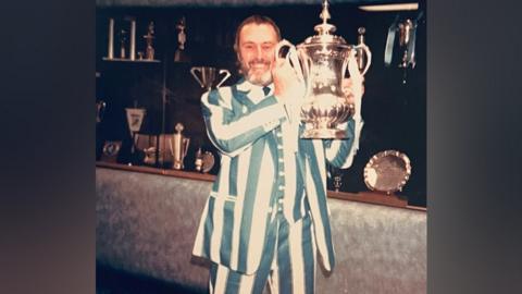 Geoff Mann holding FA Cup