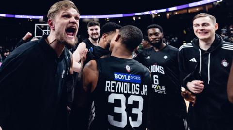 London Lions head coach Tautvydas Sabonis (left) celebrates