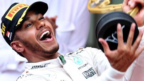 Lewis Hamilton celebrates his Monaco win