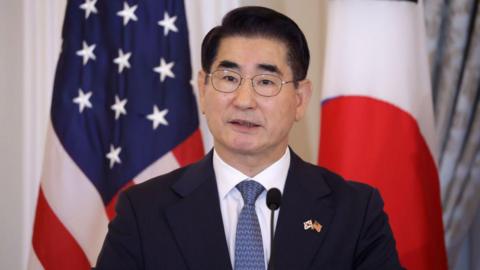 Kim Yong-hyun speaks during a joint news conference at the State Department