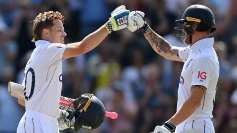 Ollie Pope celebrates with Ben Stokes