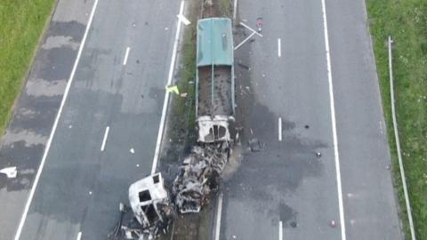 Aerial view of burnt out lorry