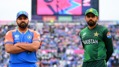 Rohit Sharma and Babar Azam standing side by side