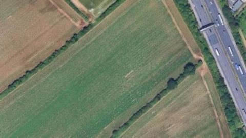 A skyview image of fields next to the M1 motorway