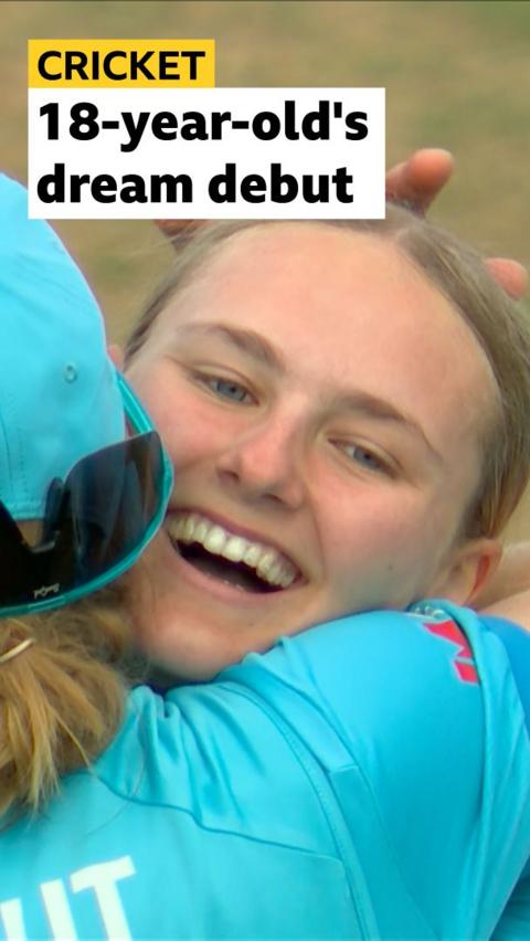 Tilly Corteen-Coleman smiling with team-mate Heather Knight hugging her 