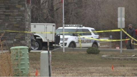 Police cars at a crime scene.