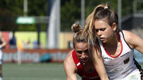 Susannah Townsend (L) of England in action against Anne Schroeder (R) of Germany during the European Hockey Championship