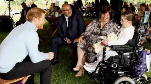 Prince Harry and an award winner