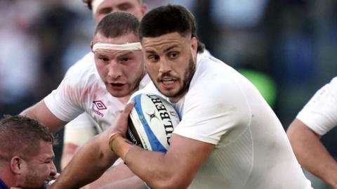 Ethan Roots carrying the ball for England
