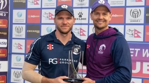 Captain Richie Berrington and head coach Shane Burger with the World Cup League 2 trophy