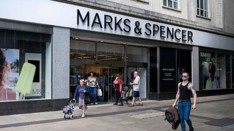 Shoppers and people outside Marks & Spencer in Swansea