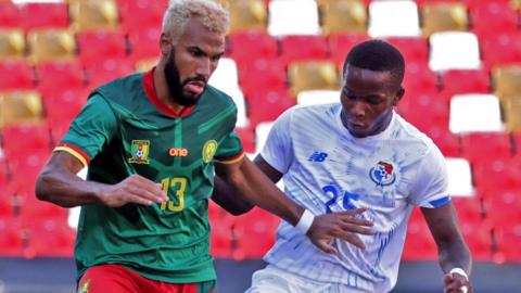 Eric Maxim Choupo-Moting (left) in action for Cameroon against Panama