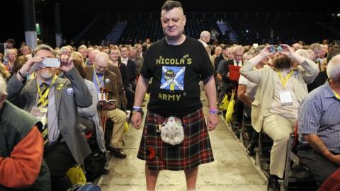 SNP delegate in kilt at conference