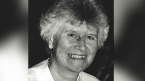 A black and white image of Beryl Purdy smiling