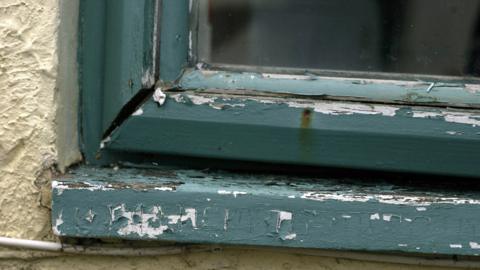 Window frame in need of repair