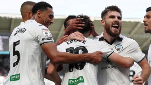 Swansea players celebrate