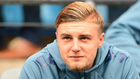Norman Bassette sitting on the Coventry substitutes' bench