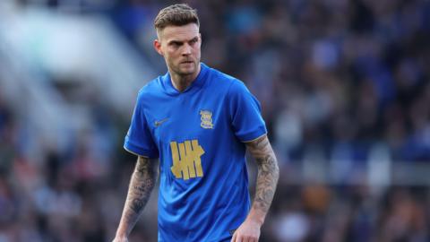 A photo of Marvin Ducksch playing football in a blue and yellow Birmingham City home kit
