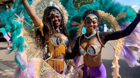 Caribbean Carnival Leicester 2022. Women dressed in elaborate and decorative costumes 
