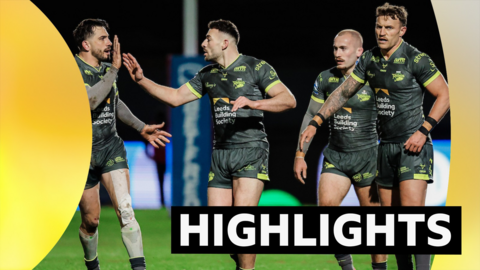 Jake Connor of Leeds is congratulated on his 40/20 by Jack Bird against Bradford