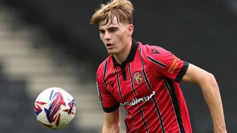 Nathan Lowe in action for Walsall