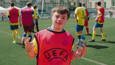 Lloyd playing football