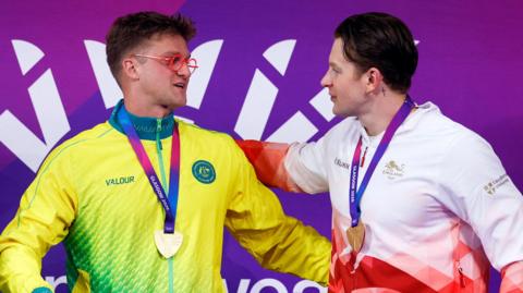 Sam Williamson and Adam Ramsay-Peaty after collecting their medals