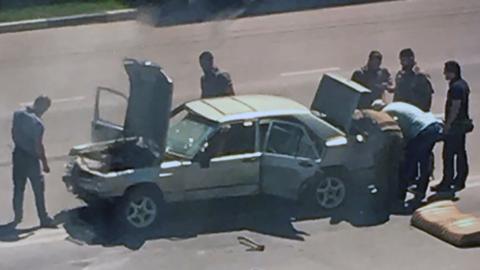 Wreck of car after attack in Grozny, 20 Aug 18