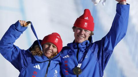 Charlotte Bankes and Huw Nightingale on the podium