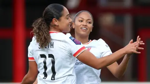 Olivia Smith celebrates