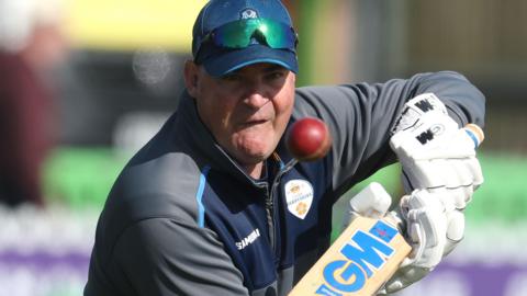 Derbyshire head of cricket Mickey Arthur gets involved with training with some batting