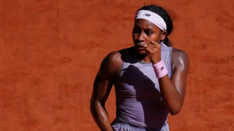 Coco Gauff celebrates with a clenched fist