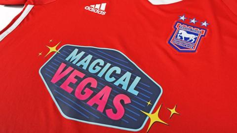 An Ipswich Town shirt with the Magical Vegas logo