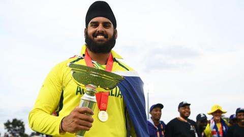 Harjas Singh holding the trophy after winning the 2024 Under-19 Cricket World Cup