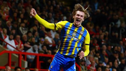 Flynn Downes celebrates