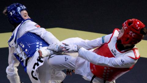 Britain's Jade Jones fights Kazakhstan's Kamila Aimukasheva at the 2022 Taekwondo World Championship in Mexico