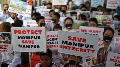 Members of the 'Chennai Manipuri community' hold a peace demonstration to protest in solidarity with the people of India's northeastern state of Manipur amid ethnic violence, in Chennai on July 9, 2023