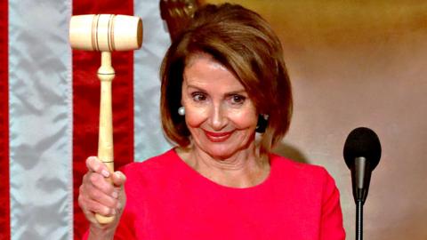 Nancy Pelosi raises the gavel after being elected as House Speaker