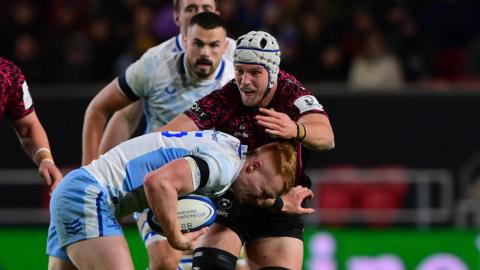 Fitz Harding makes a tackle against Leinster