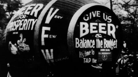 An anti-prohibition barrel which says "Give us beer, balance the budget"