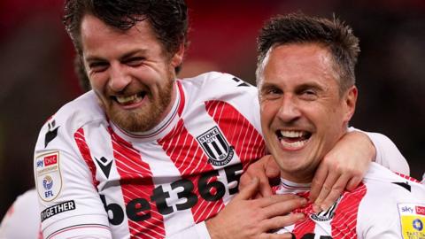 Stoke celebrate Phil Jagielka's goal against Huddersfield