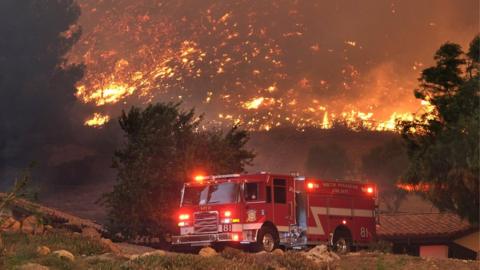 Fire truck by a fire in California