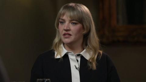 Musician Self Esteem looks to the right