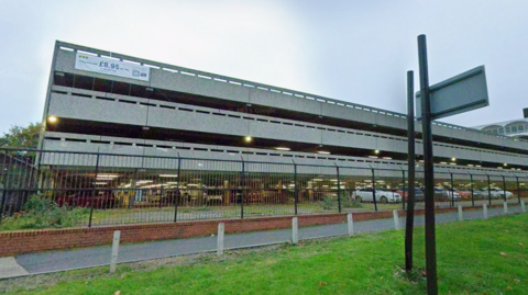A three-storey concrete car park