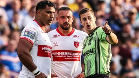 Hull KR's Tevita Pangai Junior (left) is spoken to by the referee