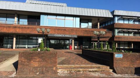 The main entrance of County Hall, Worcestershire County Council's headquarters in Worcester