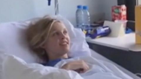Amelie Osborn-Smith in her hospital bed